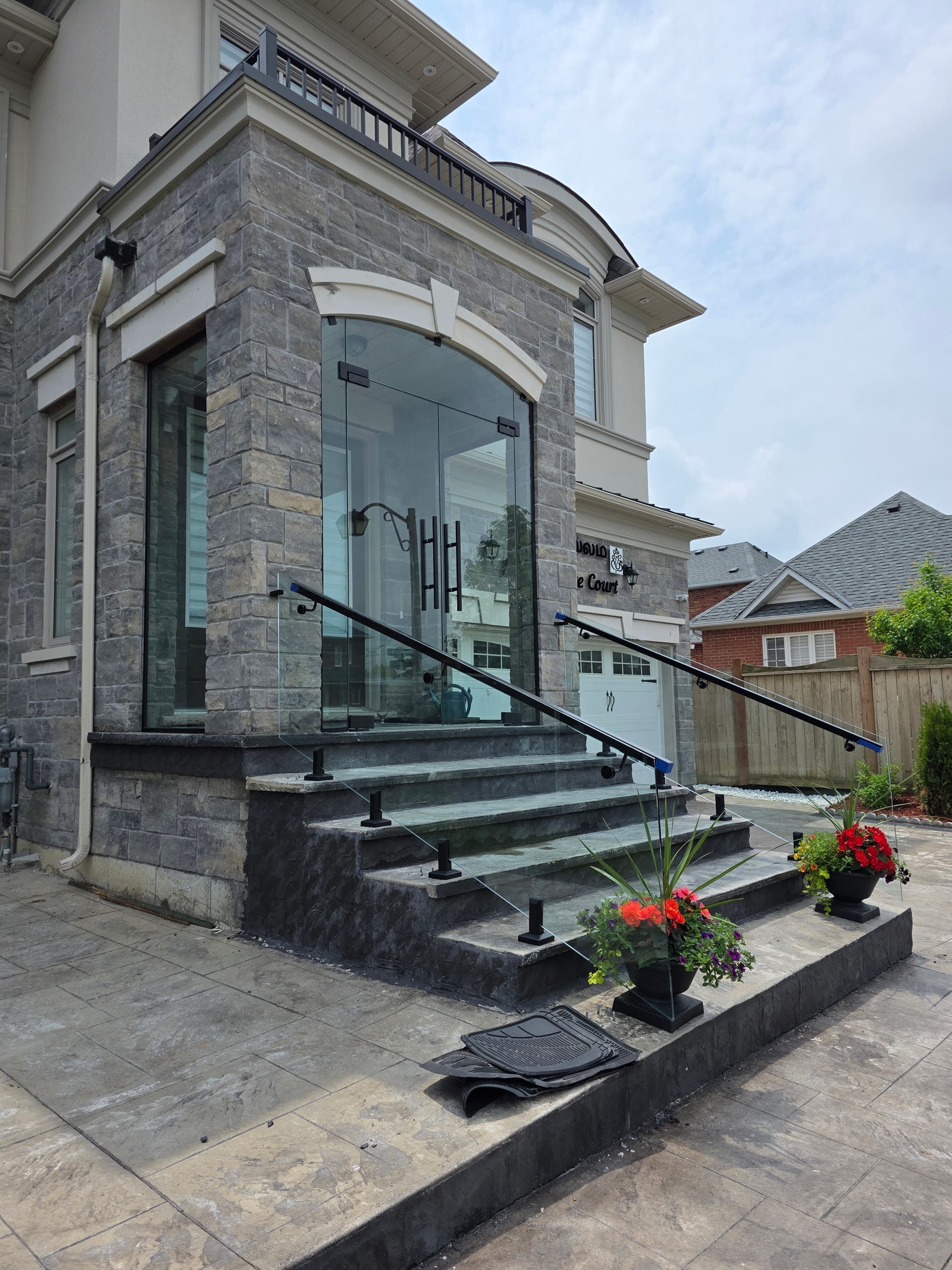 Glass porch enclosure at home entrance — Built By Glass