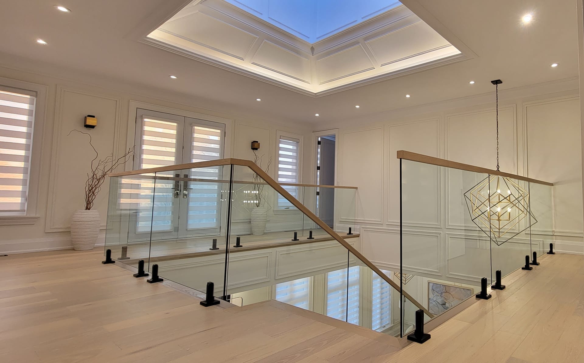Glass staircase railing installation in GTA home — Built By Glass